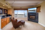 Enjoy the fireplace and tv with sounds of the waves in the background